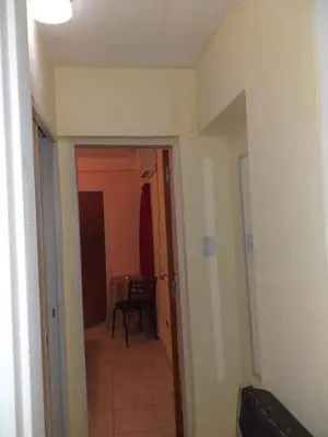 a hallway with a door leading to a room at MT Verde Barrio Jardín in Cordoba