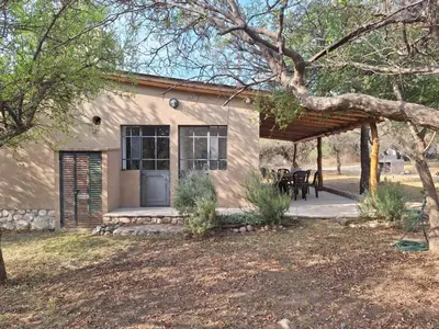 a house with a porch and a patio at La Roja y Barro tal vez in Los Molles