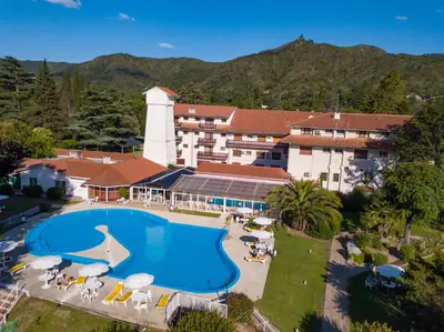 an aerial view of a resort with a swimming pool at Hotel Edelweiss in Villa General Belgrano