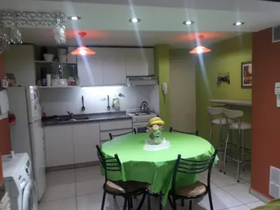 a kitchen with a table with a toy on it at Departamento Entre Rios in Villa Carlos Paz