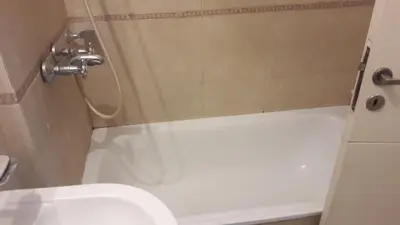a bathroom with a tub and a toilet and a sink at DPTO ALTA CORDOBA in Cordoba