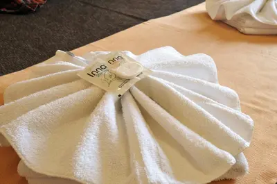 a white napkin with a price tag on it at Casa Nostra Hotel in Villa Carlos Paz