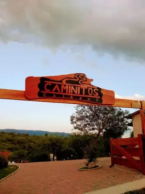 a sign for a canventhosearch at CAMINITOS in Villa General Belgrano