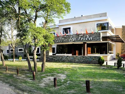 a building with a sign that reads la fila at La Frida Hotel - ADULTS ONLY in Nono