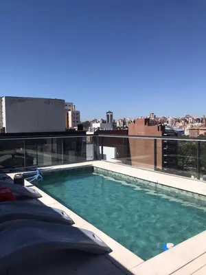 a swimming pool on the roof of a building at FOREST 7º in Cordoba