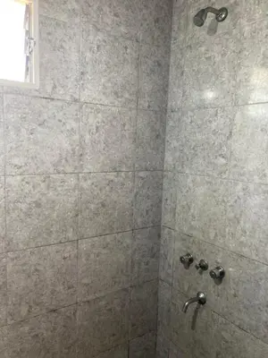 a bathroom with a shower with a glass door at Aires de las Sierras 2 in Villa Carlos Paz