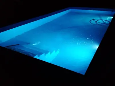a close up of a blue pool of water at Tierra Santa in Villa Cura Brochero