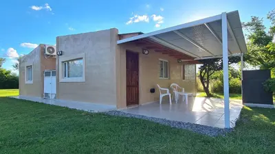 a small house with a patio and aestead at Casa Abierta in Nono