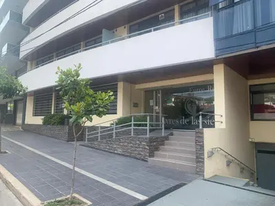 a building with a staircase in front of a building at Ayres de Las Sierras in Villa Carlos Paz