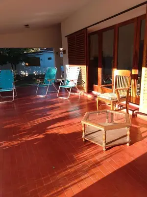 a room with chairs and a coffee table on a patio at Villa Coca -Los Jilgueros- in La Bolsa