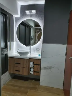 a bathroom with a sink and a mirror at Alojamiento Maria :-) in Cordoba