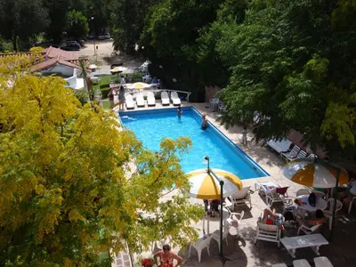 an overhead view of a swimming pool with umbrellas at Florida Hotel & Spa in Villa Carlos Paz