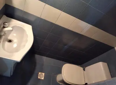a bathroom with a sink and a toilet at Casa Villa Naturaleza in Villa Rumipal