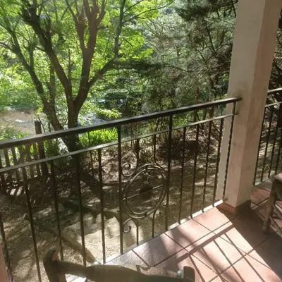 a balcony with a view of a tree at Torito's House 3 in Tanti