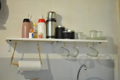 a shelf on the wall with a bunch of items at Cabaña 