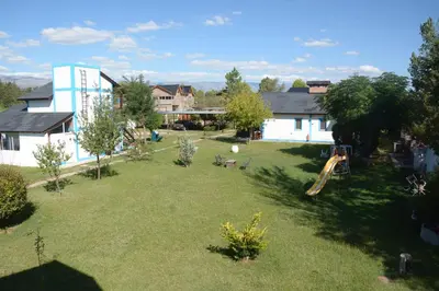 an aerial view of a yard with a playground at Aguila Blanca in Mina Clavero