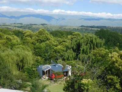 an aerial view of a house in the middle of a forest at 7 esencias in Villa Yacanto