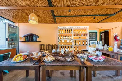 a table with a bunch of food on it at Posada El Pucara in San Javier
