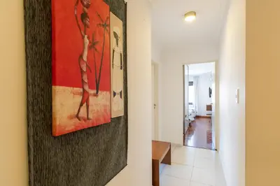 a hallway with a painting on the wall at AT Suites in Cordoba