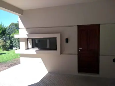 a empty room with a door and a window at Casa EBEL in Alpa Corral