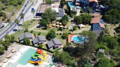 an aerial view of a water park with a pool at Hotel Montana by CPH in Villa Carlos Paz