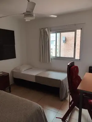 a bedroom with a bed and a window at Excelente SEMIPISO vista al Buen Pastor in Cordoba