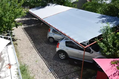 a car with a tent on top of it at Complejo Belu in Santa Rosa de Calamuchita