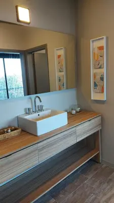 a bathroom with a sink and a mirror at LUNALBA in Potrero de Garay