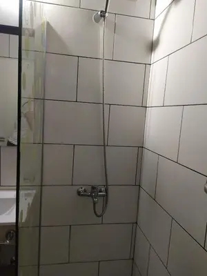 a bathroom with a shower with a glass door at Departamento 2 dormitorios Nueva Cordoba in Cordoba
