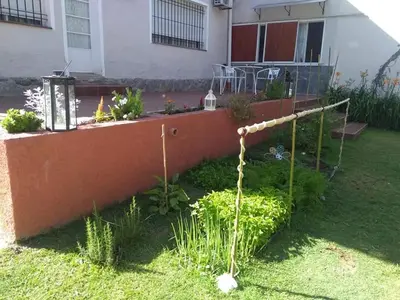 a garden in front of a house at Teilen in Villa General Belgrano