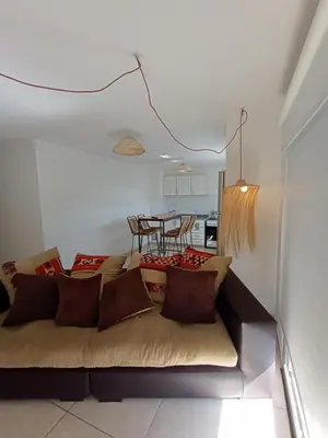 a living room with a couch and a table at Alto Tucumán in Cordoba