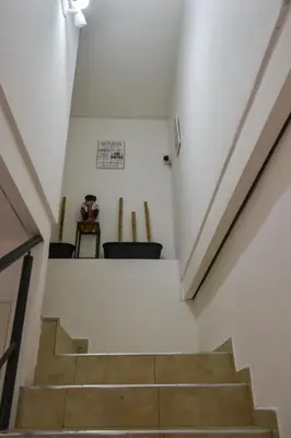 a stairway leading up to the basement of a house at Dpto con Balcón- Rafael Nuñez - Cerro de las Rosas in Cordoba