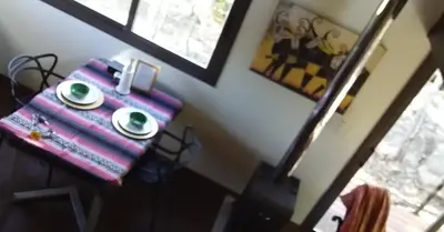 a table with two cups of coffee on top of it at Torito's House 1 in Tanti