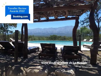 a view of the pool from the patio of a house at La Morada, imperdible Casa de Campo en La Matilde in San Javier