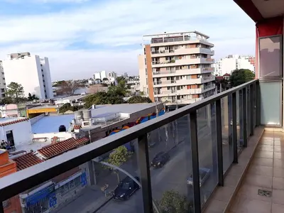 a balcony with a view of a city at Plaza Rivadavia Departamento in Cordoba