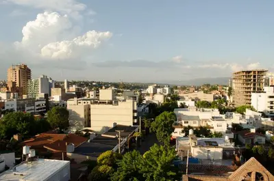 a view of a city with buildings and trees at Departamentos Premium Miralejos 3 in Villa Carlos Paz