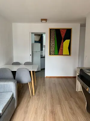 a living room with a couch and a table at Salguero Residential Apartament in Cordoba