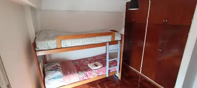 a small room with two bunk beds in it at Illía Residential Apartament in Cordoba