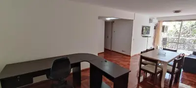 a living room with a table and chairs and a dining room at Illía Residential Apartament in Cordoba