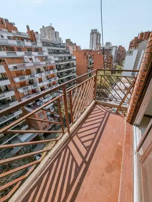 a balcony on a building with a view of a city at DPTO 1 CUADRA SANATORIO ALLENDE in Cordoba