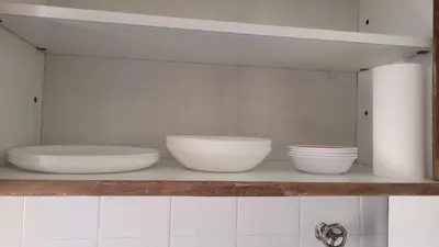 three bowls sitting on a shelf in a kitchen at cañada in Cordoba