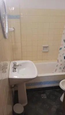 a bathroom with a sink and a bath tub at cañada in Cordoba