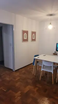 a room with a table and two chairs and a desk at cañada in Cordoba