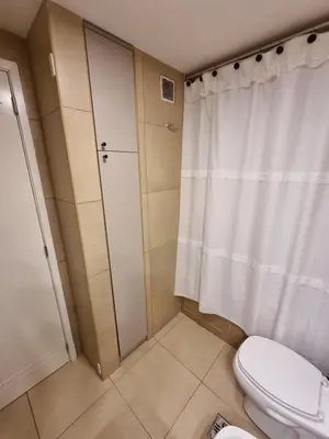a bathroom with a toilet and a shower at Nueva Córdoba - Premium in Cordoba
