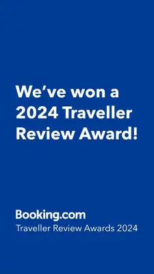 a blue sign that says weve won a traveler review award at Nueva Córdoba - Premium in Cordoba