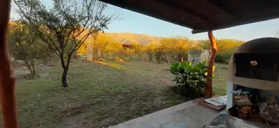 a view of a yard from the back of a house at La Ecle in San Javier
