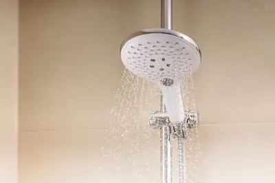 a shower head with water coming out of it at NH Córdoba Panorama in Cordoba
