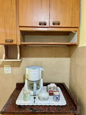 a coffee maker on a counter in a kitchen at terrazas del Tajamar in Alta Gracia