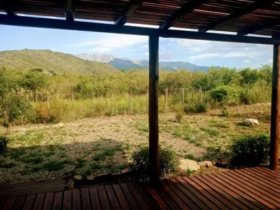 a view from a porch with a view of mountains at Monte Sion cabañas & relax in San Javier