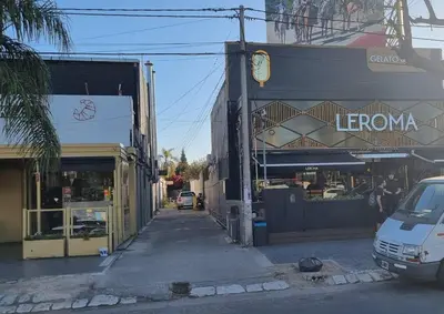 a street with a store on the side of a building at Dpto s/av Rafael Nuñez - 1 dorm y balcon in Cordoba